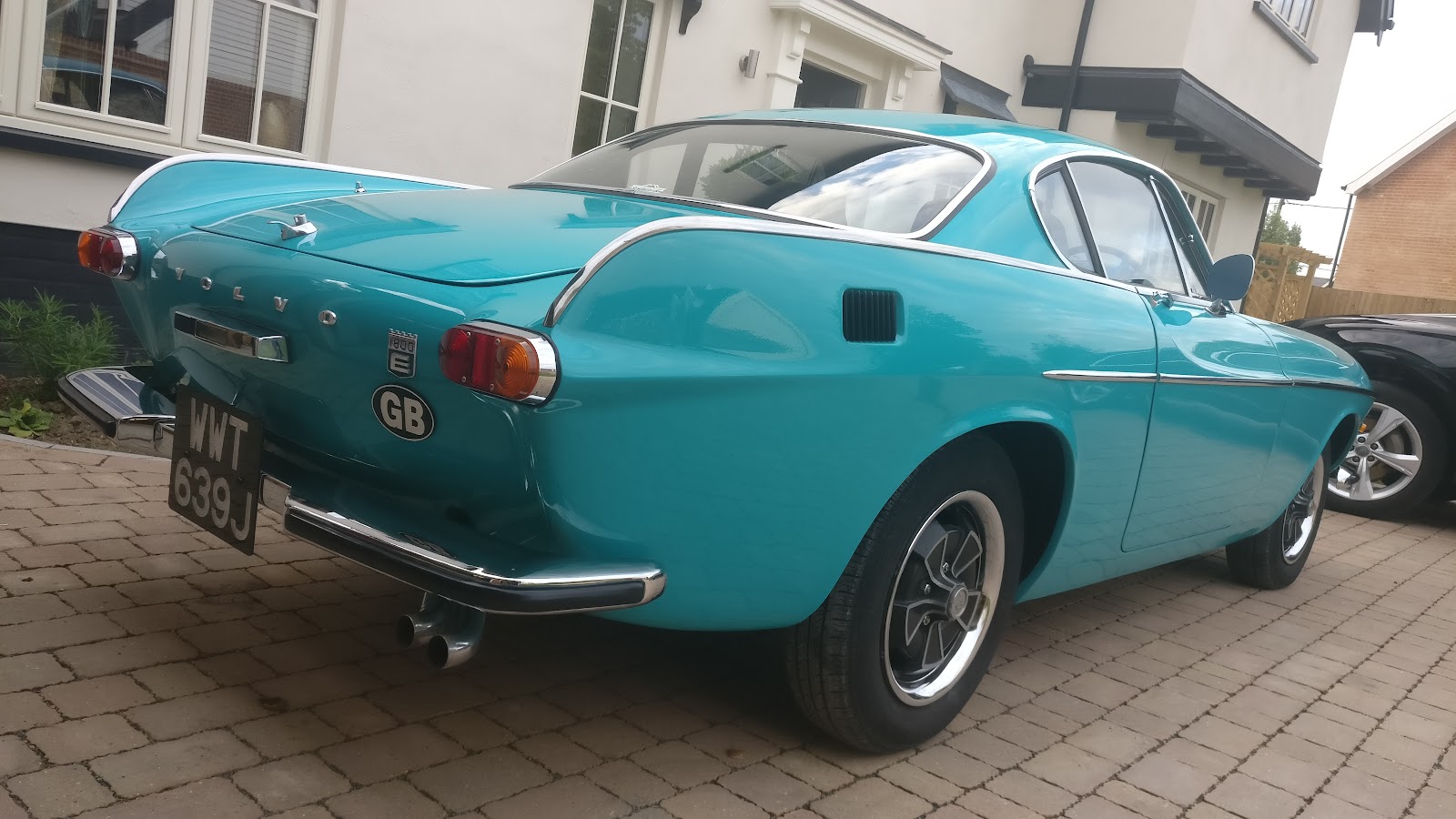 Classic blue Volvo photographed outside